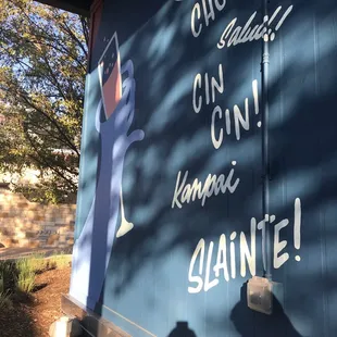 a man standing in front of a sign