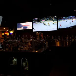 a hockey game on the big screen