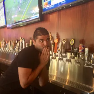 I asked Johnny, one if the bartenders, to &quot;look cute&quot;, and this is his little booty pop next to the taps. What a baller.
