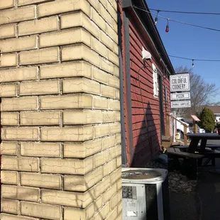 On the right side there is The entrance with seating and napkins.