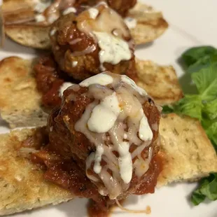 Red wine marinara meatballs with garlic herb focaccia bread