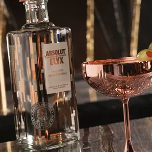 a martini and a bottle