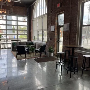 Lots of cozy seating and has a garage door to open and let the breeze in!