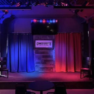 a stage with red and blue lights
