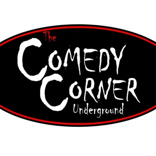 a black oval sign with the words comedy corner underground
