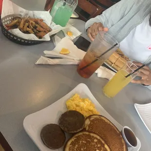 Tropical mimosa, pitcher of the da, chicken nuggets, pancakes, Philly cheesesteak