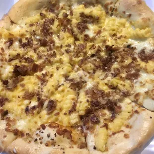 a pizza with sausage and cheese
