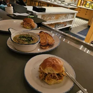 two plates of food on a counter