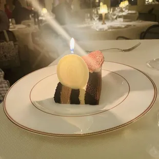 Chocolate cake. Our compliments to the pastry chef.  White chocolate medallion.   We also enjoyed strawberry sorbet.