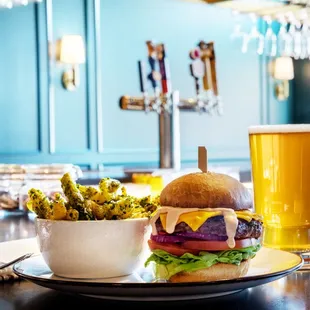 A burger and beer at the bar