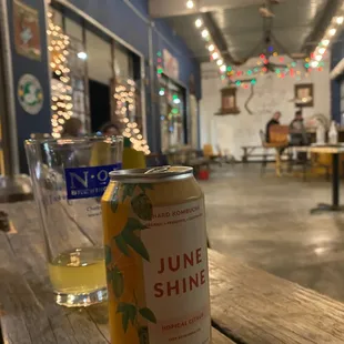 a can of juice on a table