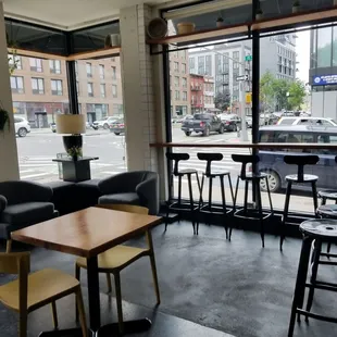 a view of a city street through a window