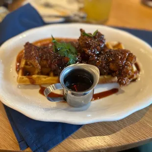 The service A1, the Sriracha Chicken, and waffles are some of the best that I have ever had. The spicy mixed with sweet...  HEAVENLY