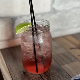 a drink in a mason jar
