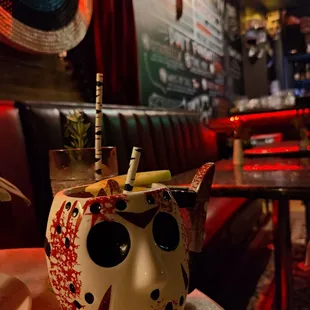 a skull mug on a table
