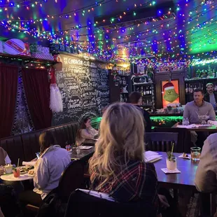 a group of people sitting at tables