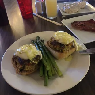 Crab cakes eggs Benedict with sautéed asparagus