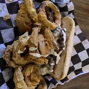 Grilled Sirloin Melt and onion rings.