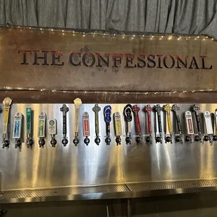 a row of beer taps