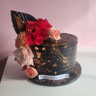 a chocolate cake decorated with flowers