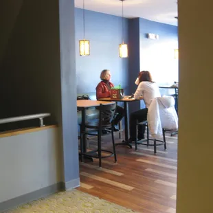 two women sitting at a table