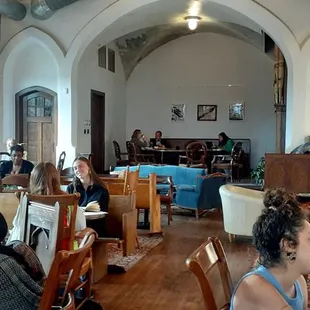 Seats about 40 inside. Communal seating and 2 tops. Curious if that organ works. Building over 100 years old.