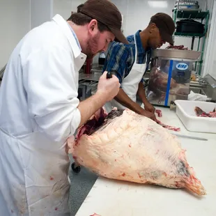 two men in a kitchen