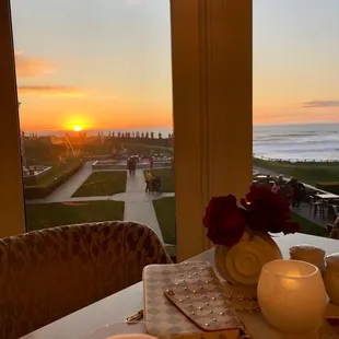 a view of the ocean from a dining table