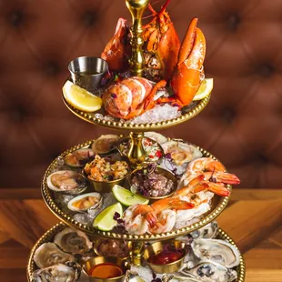 The Consulate Tower - Dozen oysters, 6 clams, tartare trio, 1 lobster  and 6 shrimp