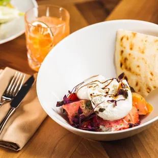 Hairloom Tomato Salad - burrata cheese, mint, curasau bread (seasonal fruit)