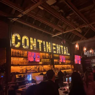 people sitting at the bar