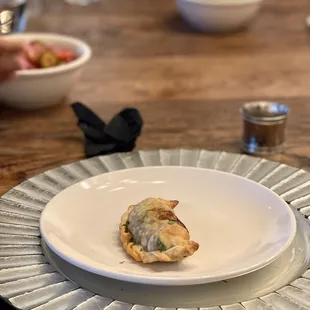 Sazon Class - Ground Beef empanada. The avocado salsa and pickled veggies are in the back. Simple but tasty!