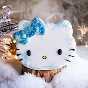 a hello kitty cookie in the snow
