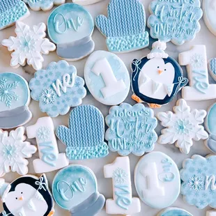 a pile of decorated cookies