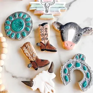 a variety of decorated cookies
