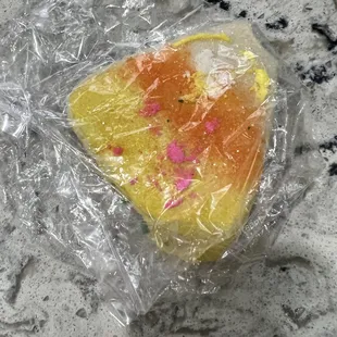 a piece of cake wrapped in plastic