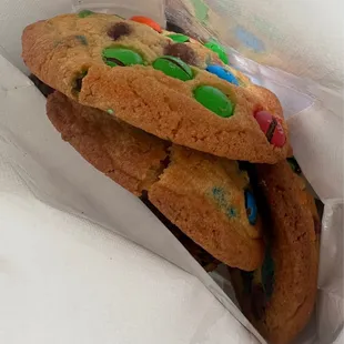 two cookies in a paper bag