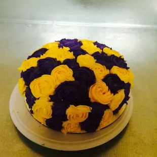 a yellow and purple cake