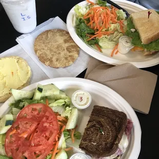 Two lunches, both 1/2 sandwich, salad and cookie