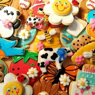 a pile of decorated cookies
