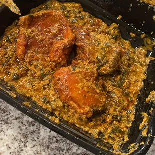 Egusi with party wing chicken , tripe, and beef.