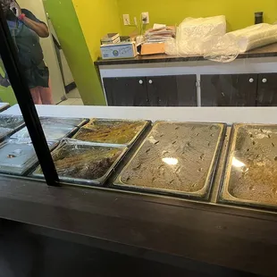 a man taking a picture of food