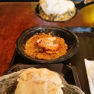 So, let me school you: Scoop some soup, then scoop a little fufu on top. You're welcome.