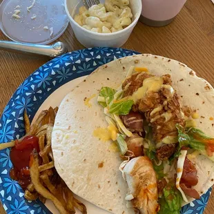 Cookshak fried chicken tender strips; added to my own wrap, veggies, cheeses, and sauces. Cookshak fries and mac.