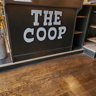the sign for the coop