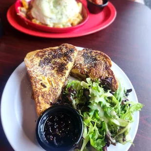 Monte cristo sandwich paired with spring mix with lemon vinegrette- to die for!!