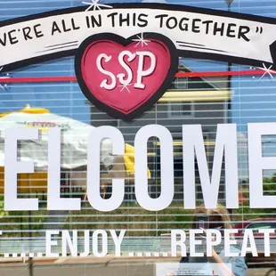 a sign in the window of a restaurant