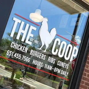 a sign in the window of a restaurant