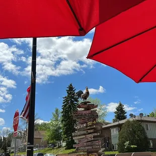 a red umbrella on a sunny day