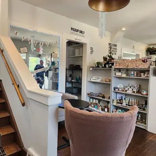 Main floor: Order Pickup window, some more seating area, stairs to upper rooms ... Items for sale